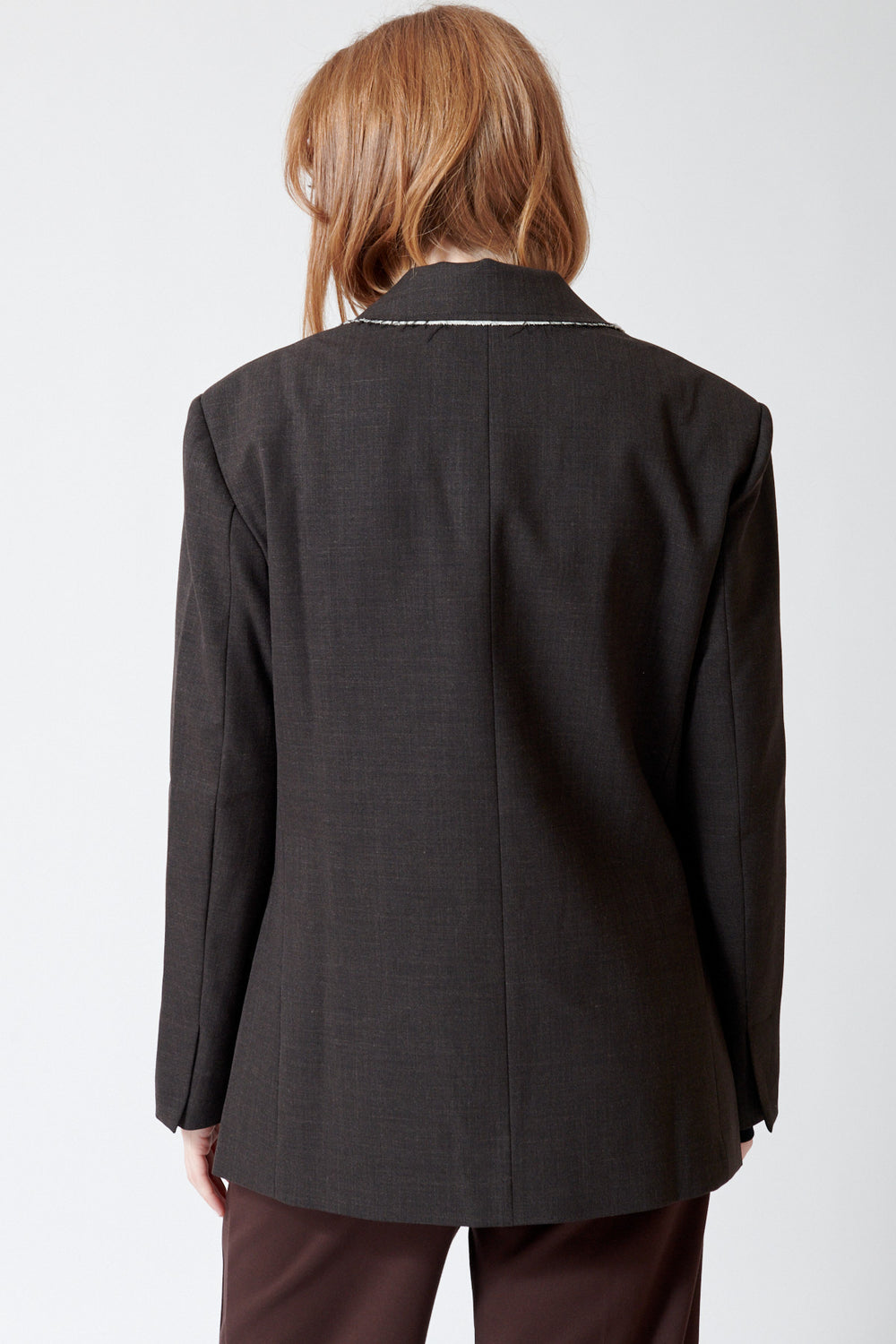 Waverly wearing Meimeij Raw Edge Single Button Blazer rear view