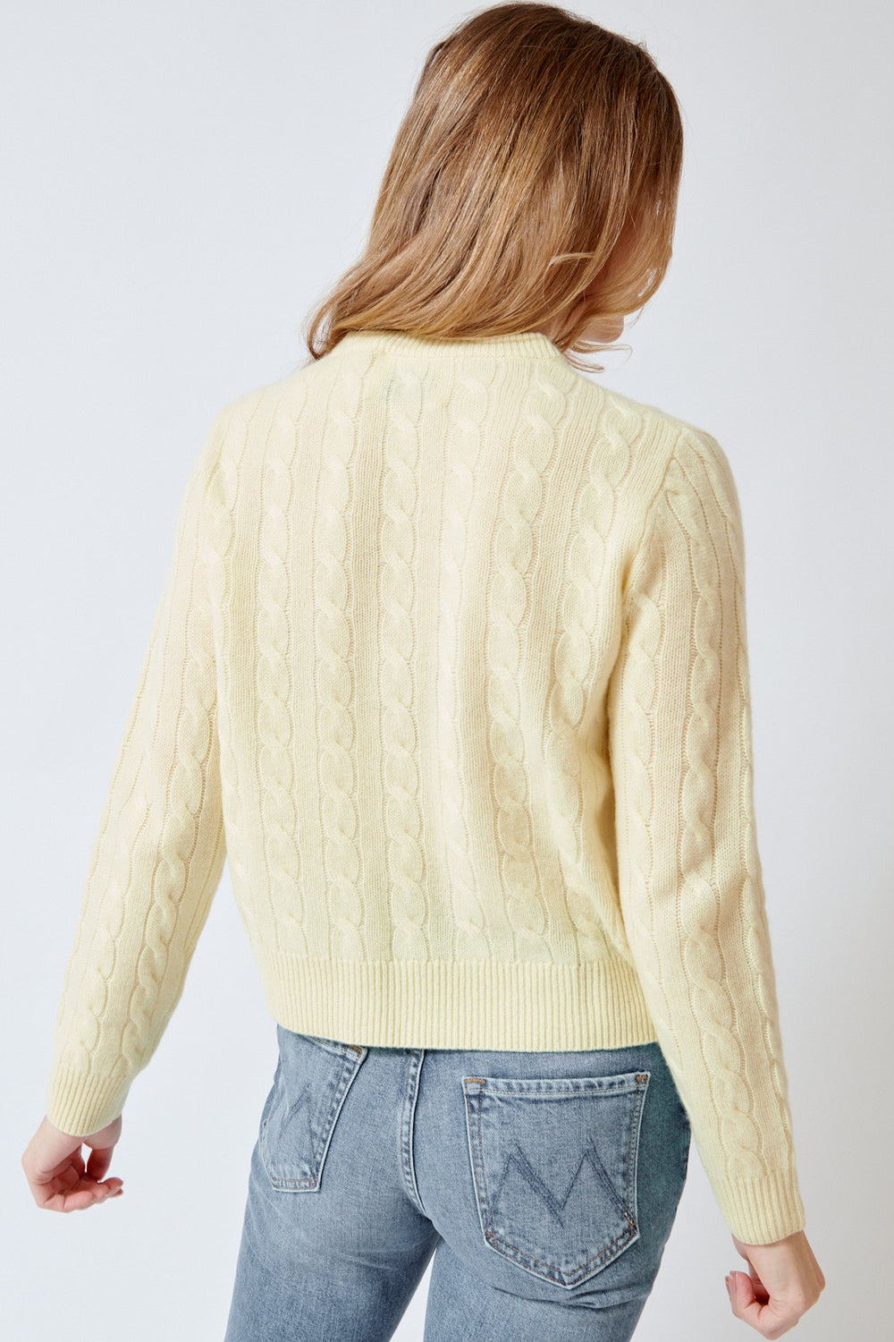 Mari wearing White + Warren Cashmere Varsity Cable Crewneck rear view