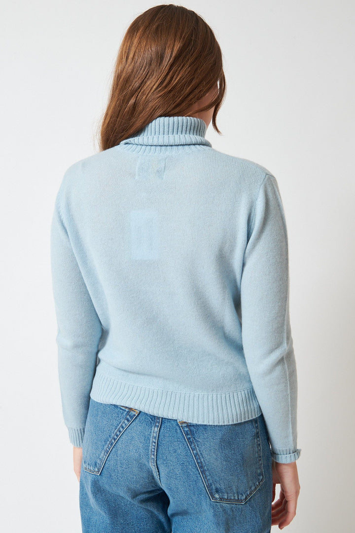 Julia wearing Jumper 1234 Light Roll Collar rear view