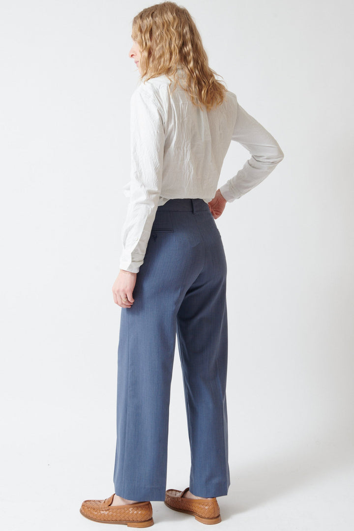 Madi wearing WE-AR4 The Avenue Pant rear view