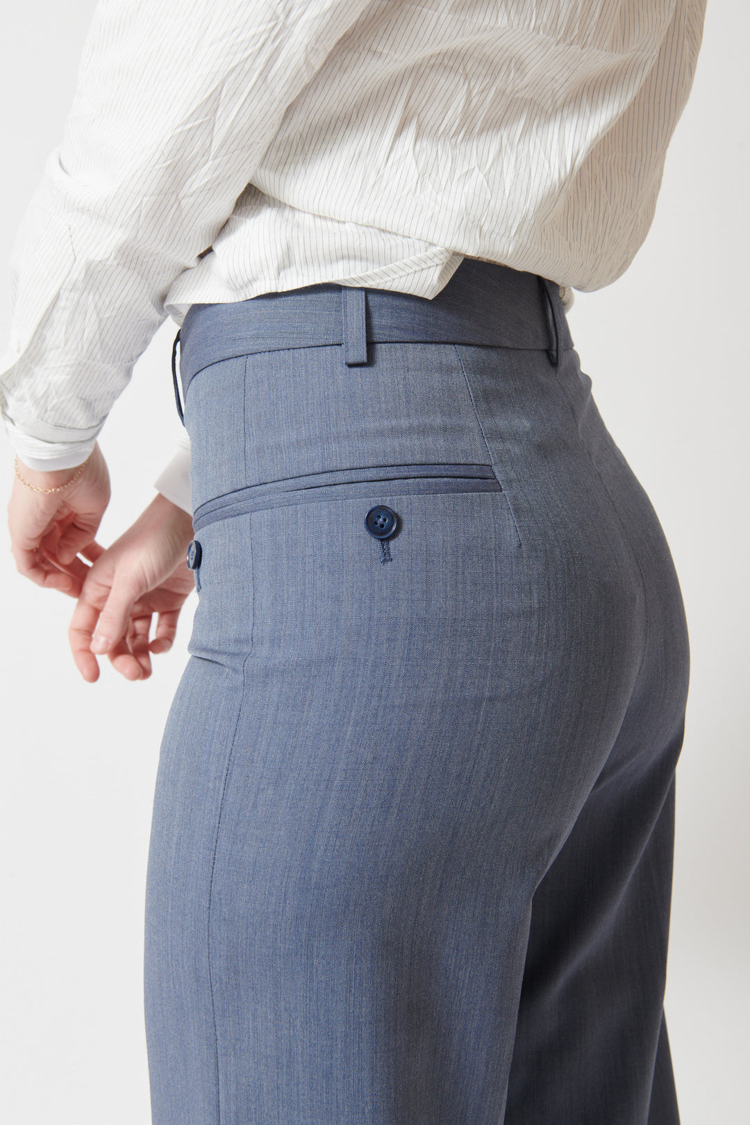 Madi wearing WE-AR4 The Avenue Pant rear/detail view