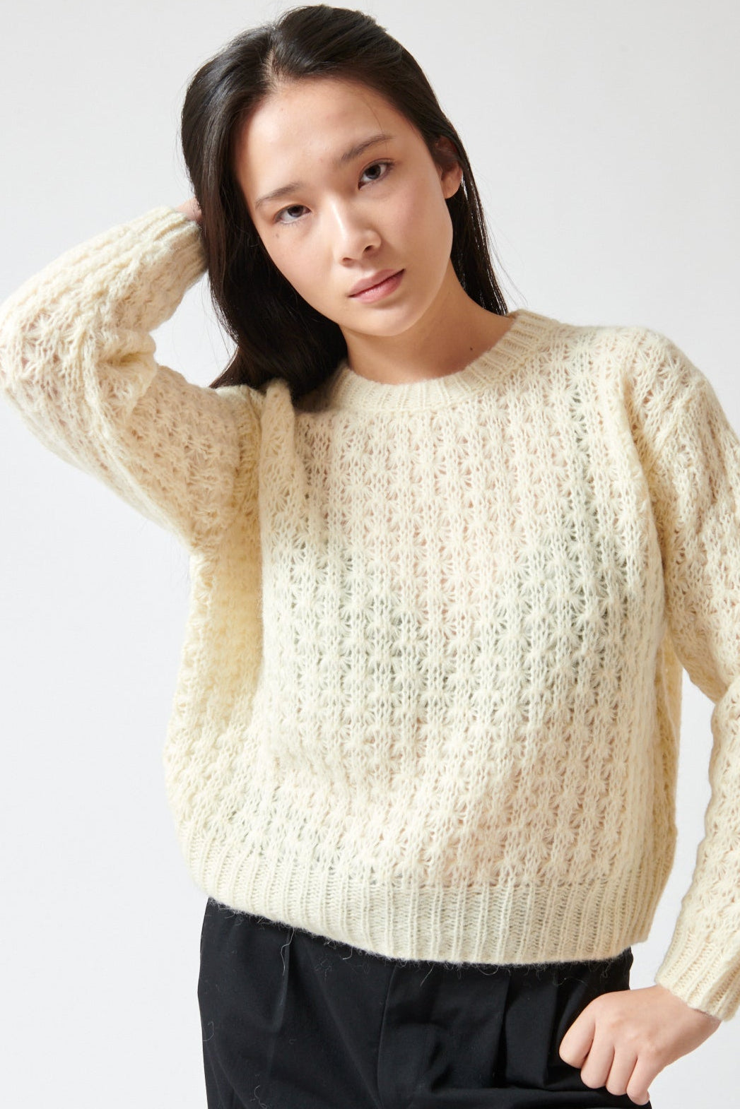 Lilly wearing Peserico Virgin Wool And Alpaca Blend Knitted Sweater front view