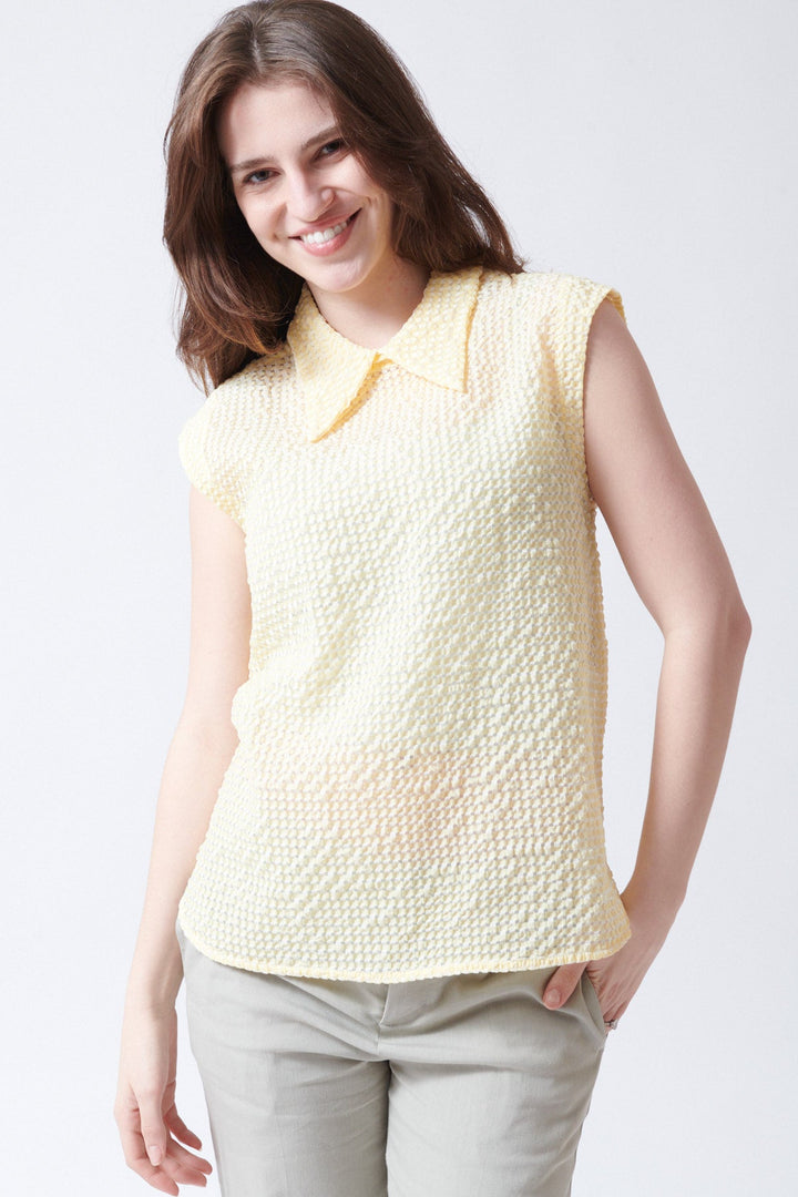 Sophie wearing Tela Oslo Top front view