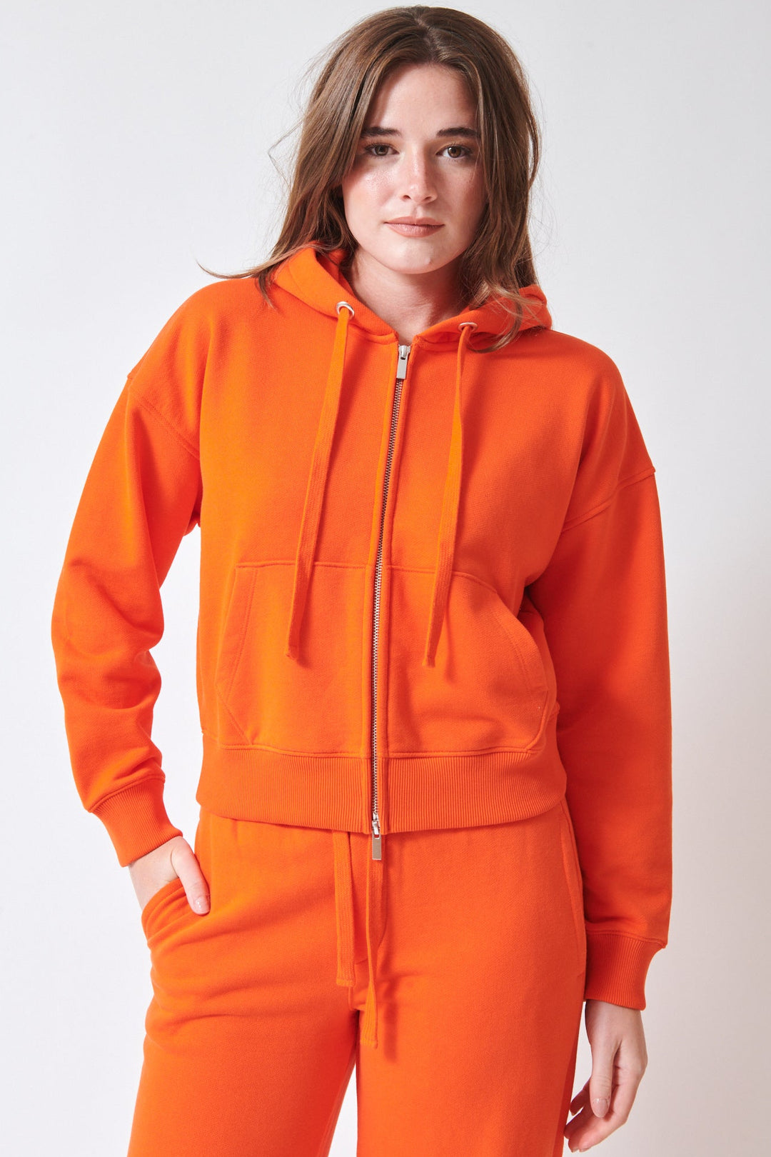 Julia wearing ATM Anthony Thomas Melillo Cotton Cropped Zip Up Zip Down Hooded Sweatshirt front view