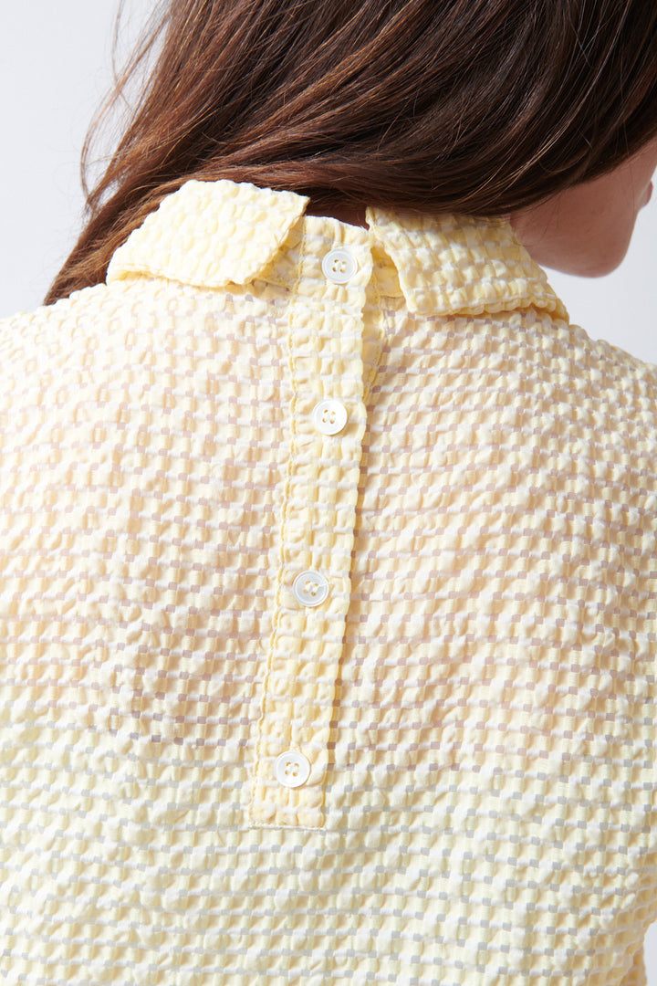 Sophie wearing Tela Oslo Top rear/detail view