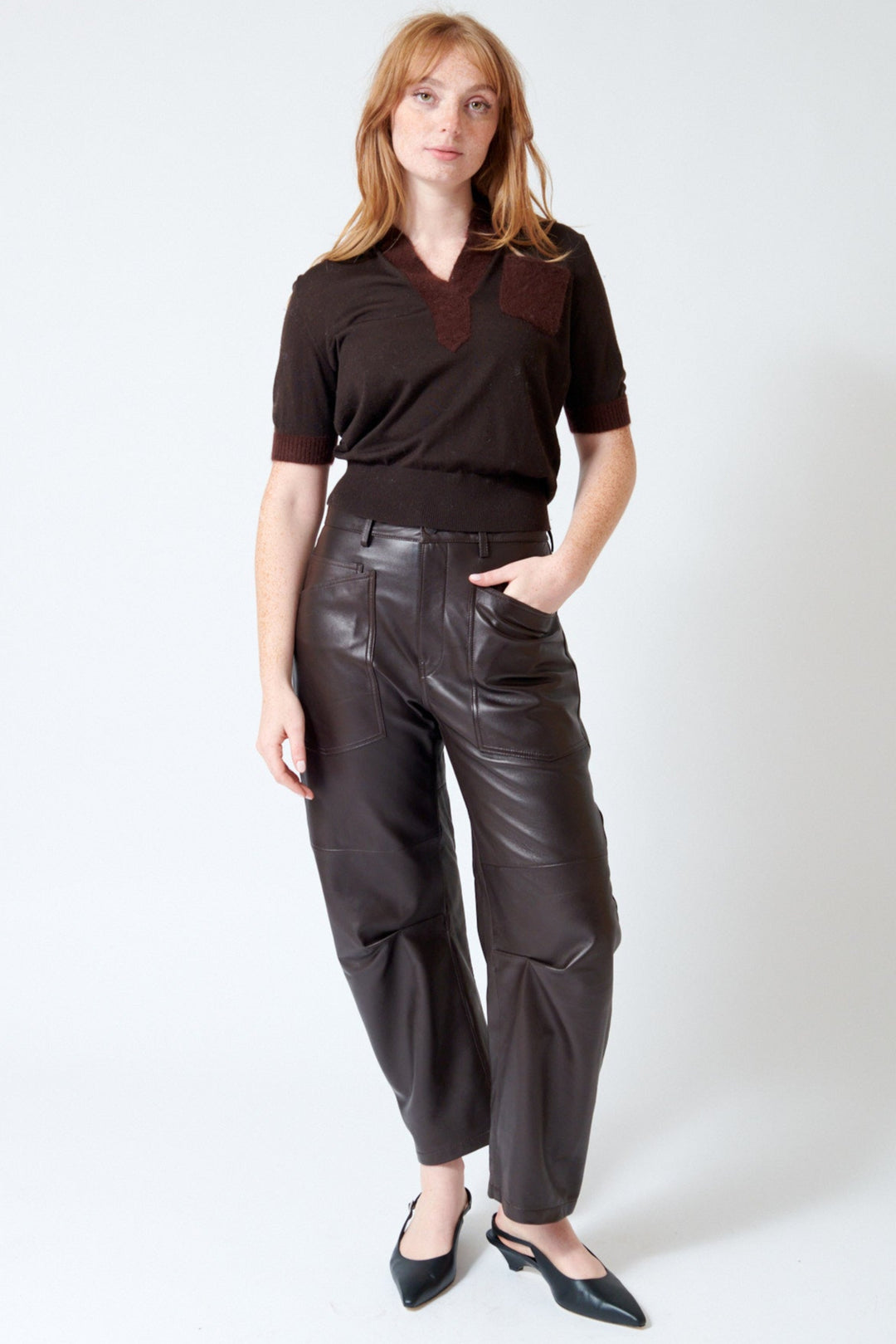 Waverly wearing Nili Lotan Shon Leather Pant in Dark Brown, front view.
