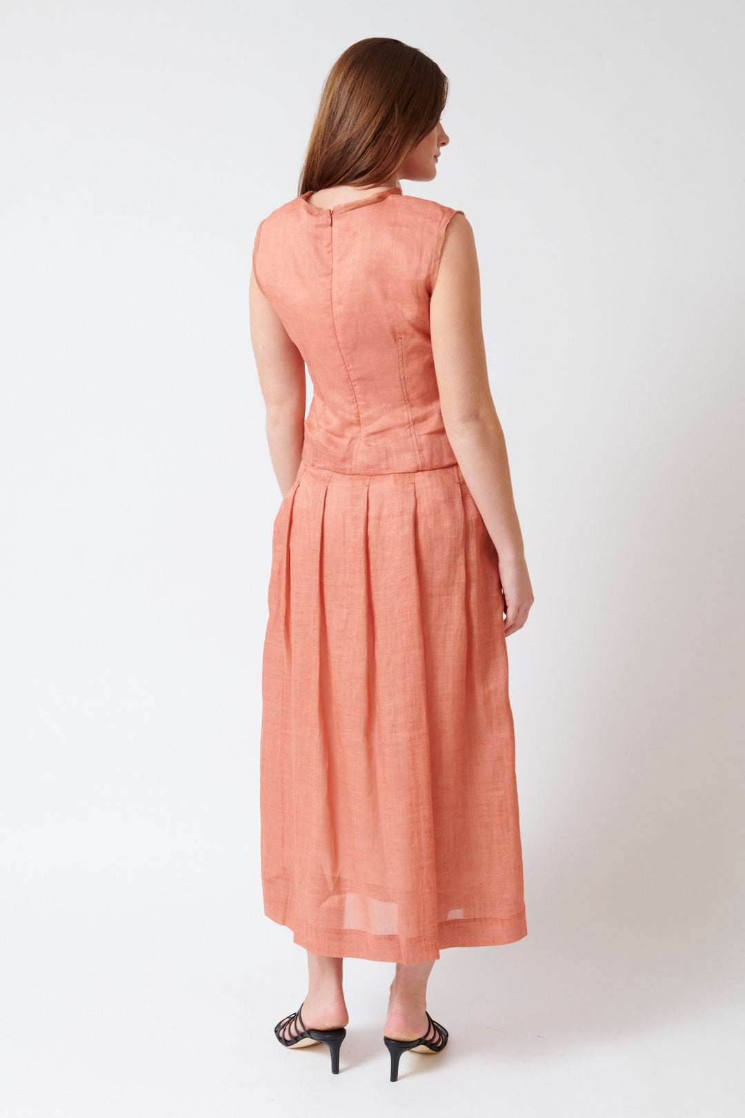 Julia wearing Tela Zita Skirt rear view