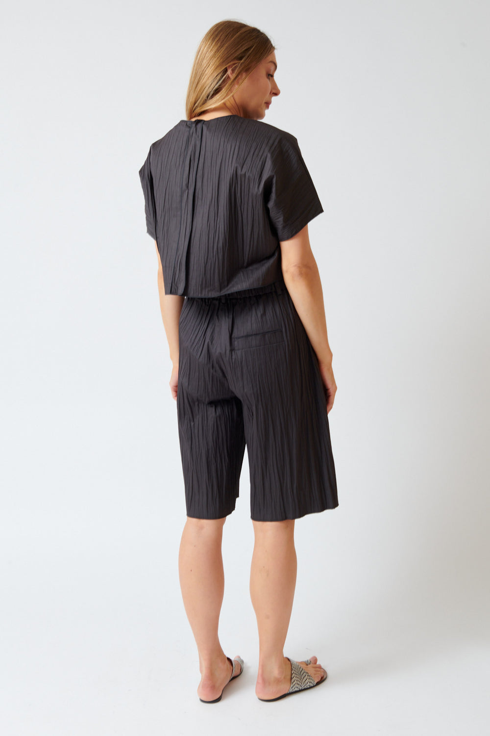 Mari wearing Tela Most Bermudas rear view