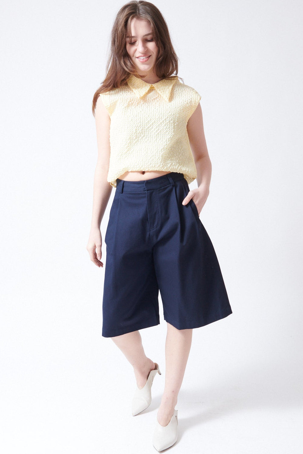 Sophie wearing Tela Lake Bermudas front view