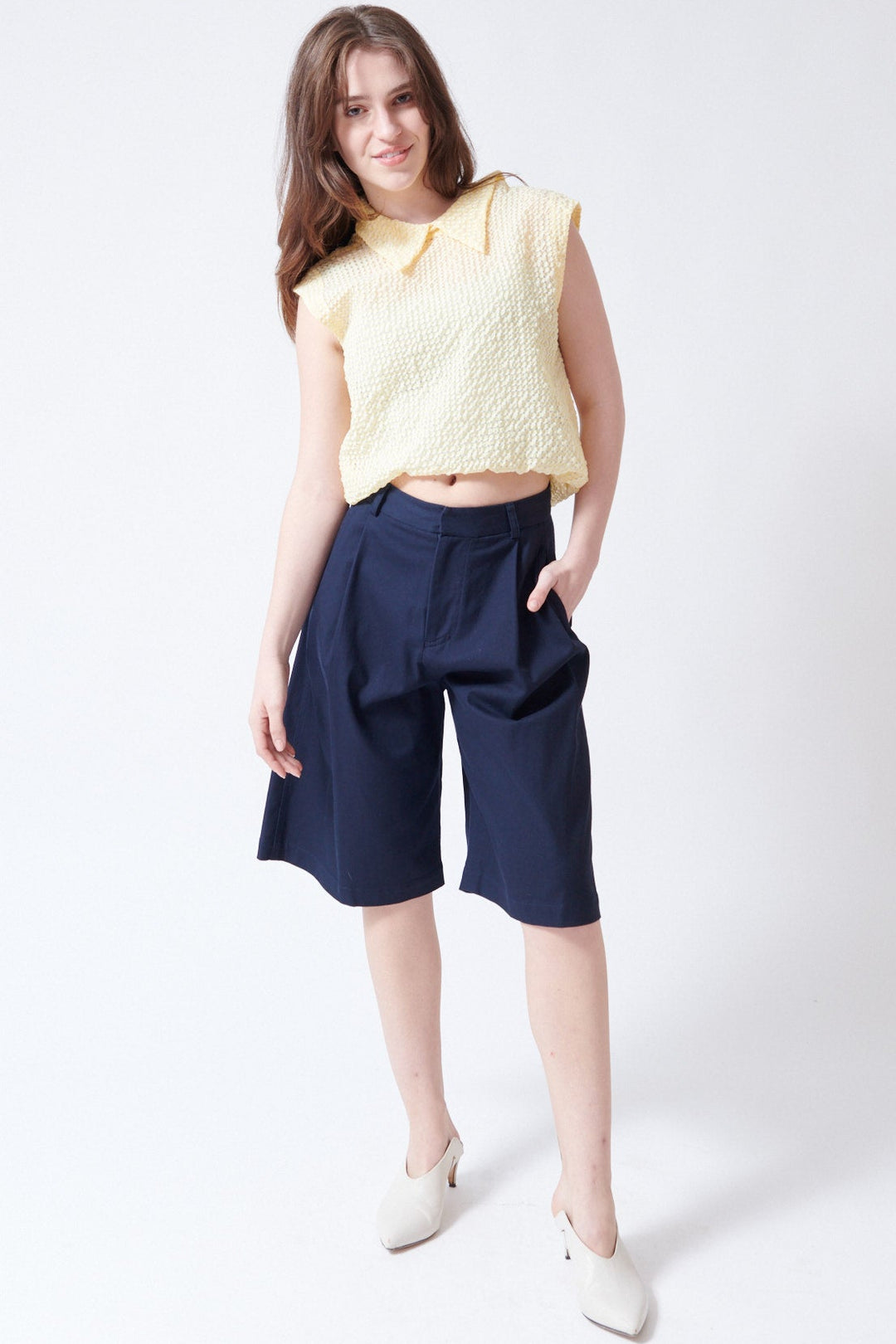 Sophie wearing Tela Lake Bermudas front view