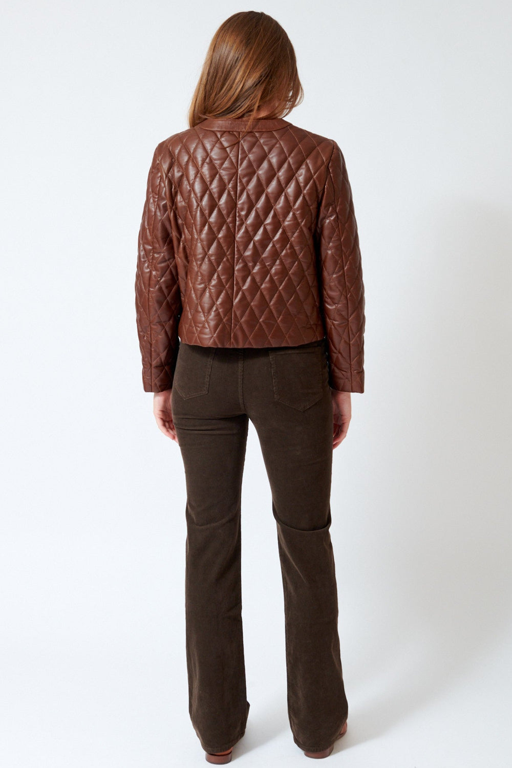 Waverly wearing Nili Lotan Joan Pant in Chocolate Brown, rear view.