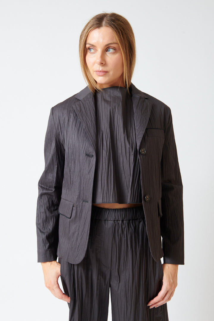 Mari wearing Tela Nomad Jacket Black front view