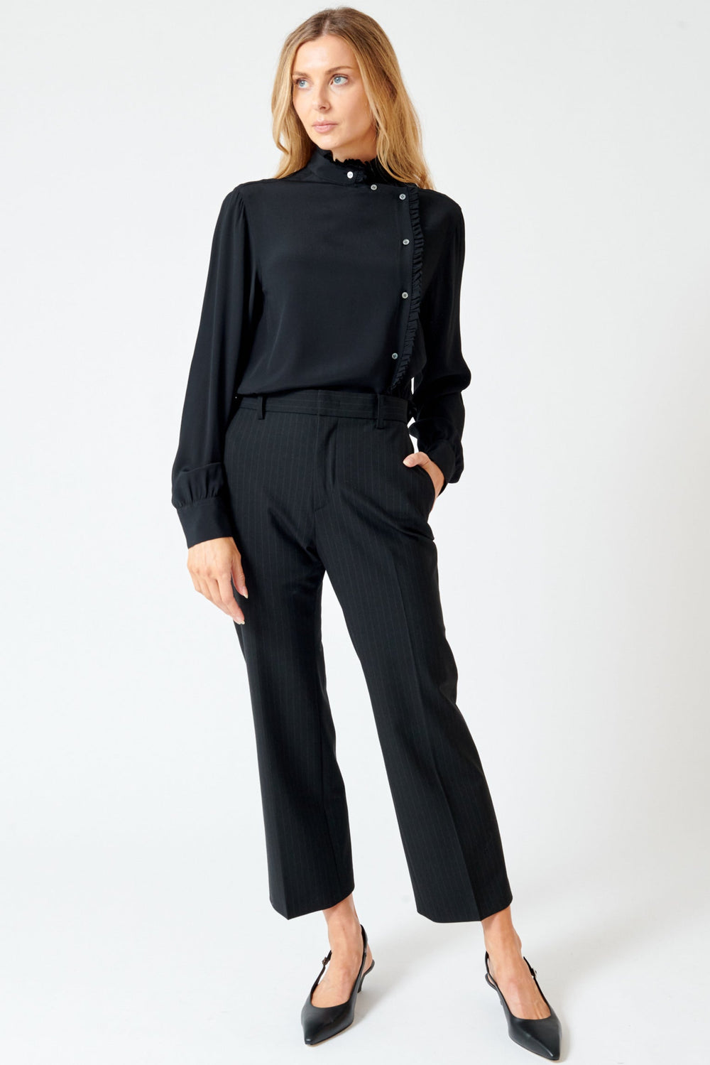 Mari wearing N°21 Elastic Back Pinstripe Trouser front view