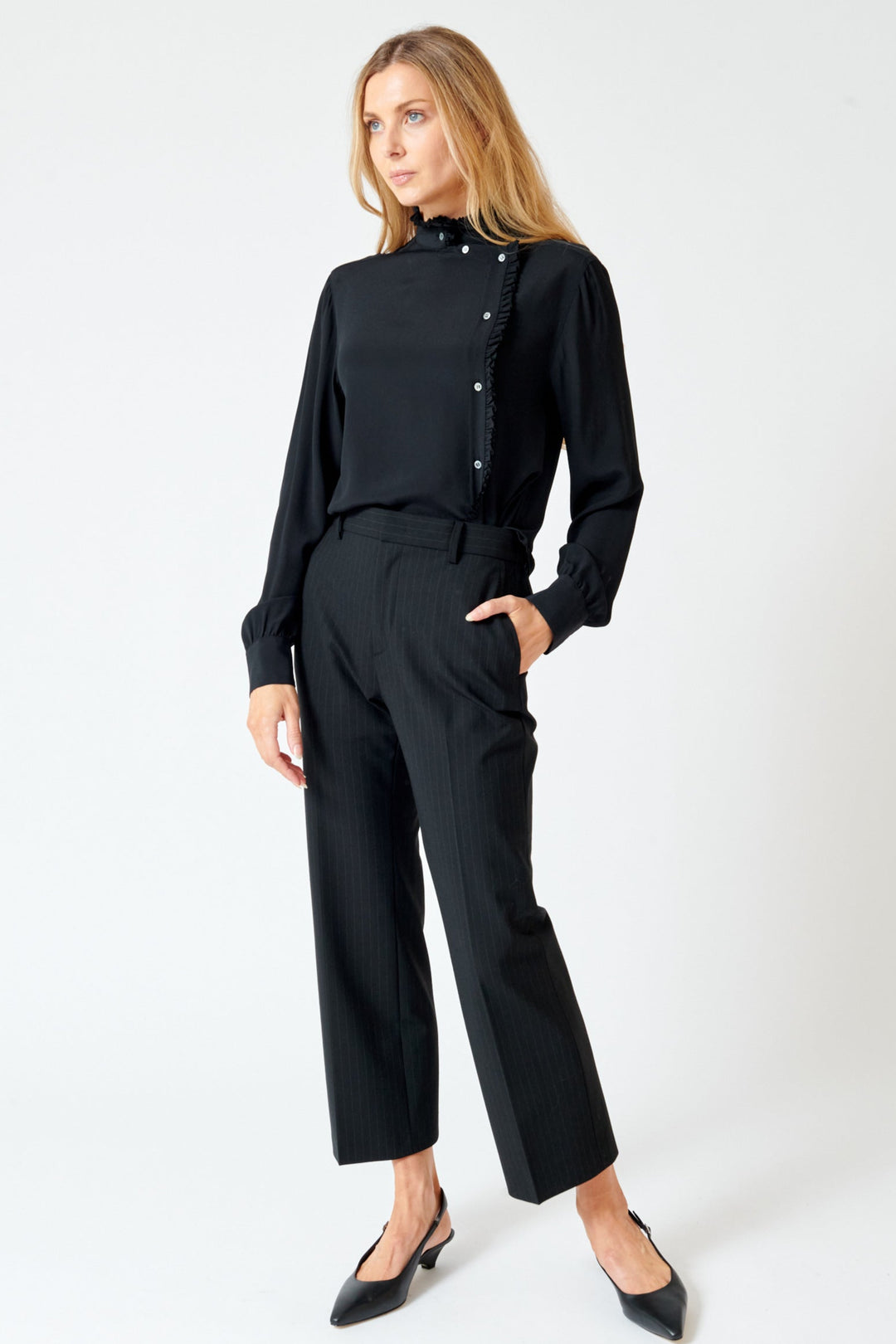 Mari wearing N°21 Elastic Back Pinstripe Trouser front view