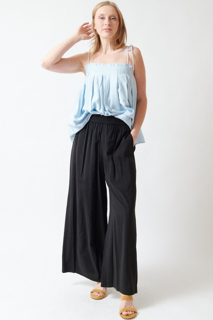Madi wearing ELEH Beata Elastic Waist Trousers front view