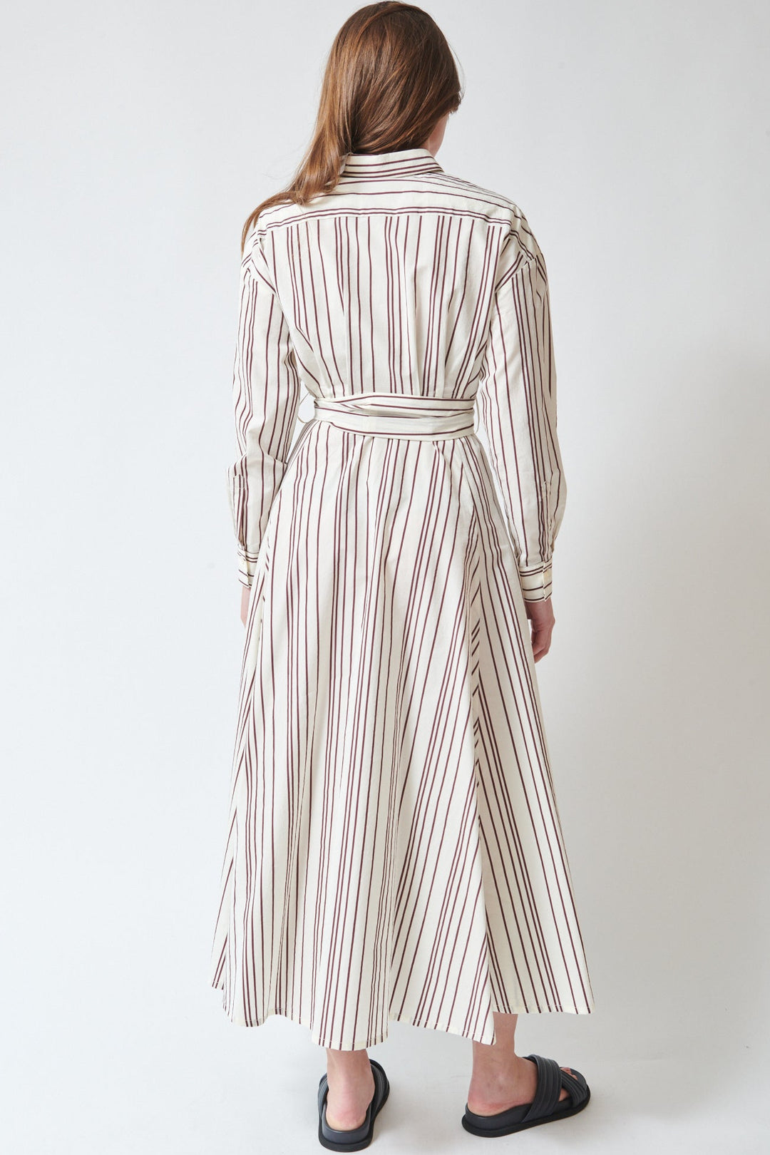 Julia wearing Odeeh Fancy Stripe Dress Burgundy rear view