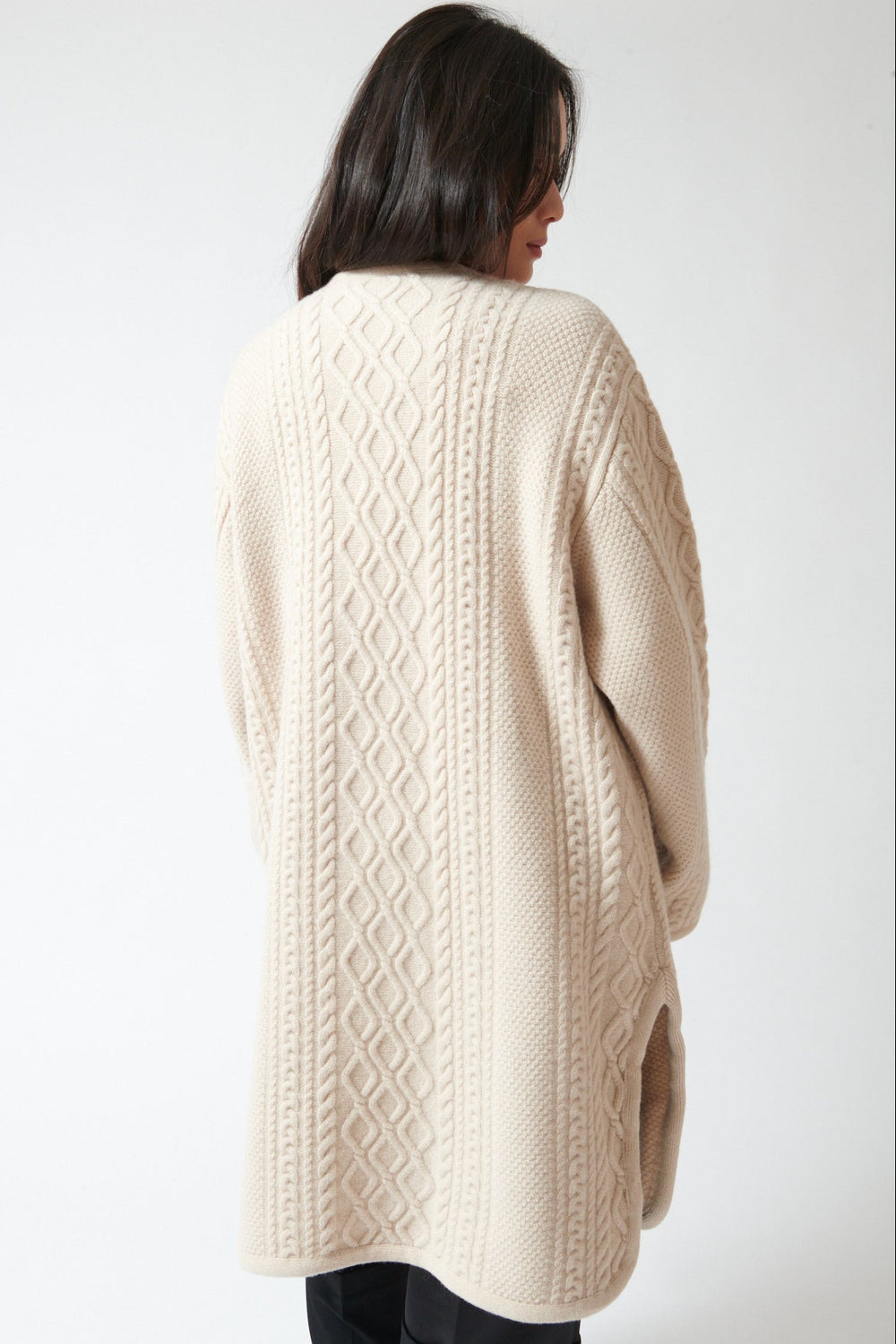 Lilly wearing White + Warren Merino Luxe Cable Coat rear view