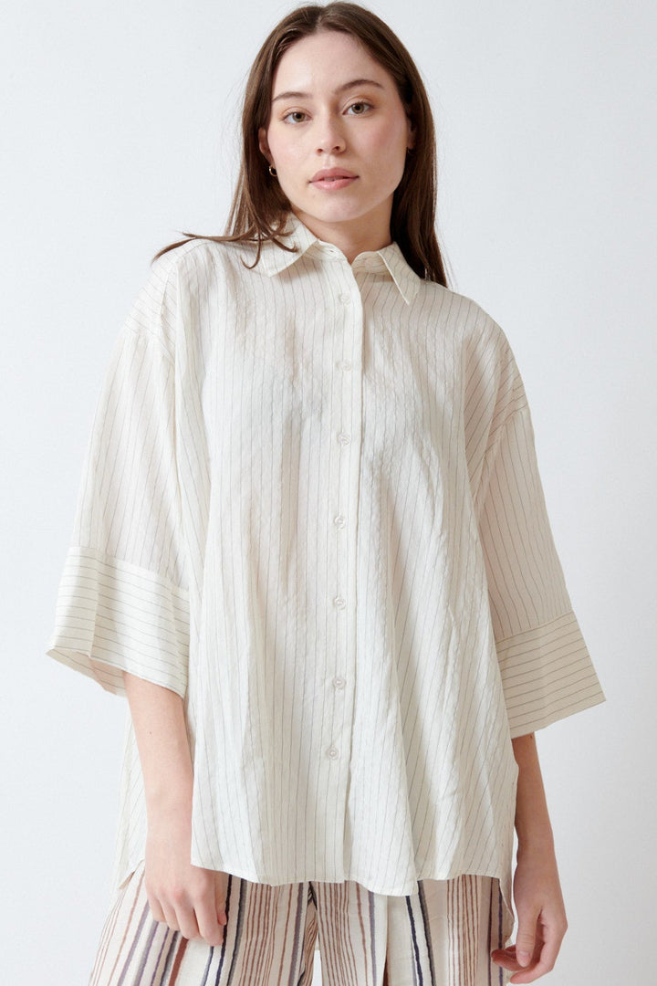 Angela wearing ELEH Monica Striped Shirt Vanilla And Anise front view