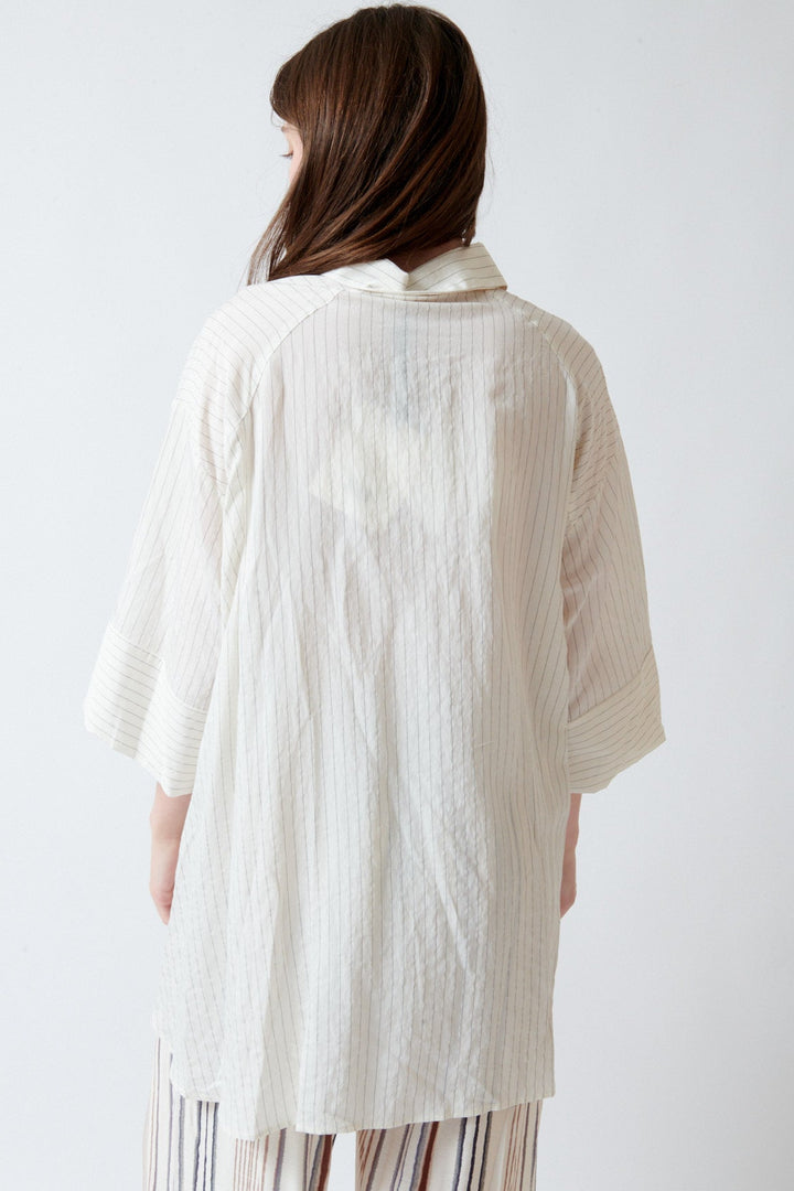 Angela wearing ELEH Monica Striped Shirt Vanilla And Anise rear view