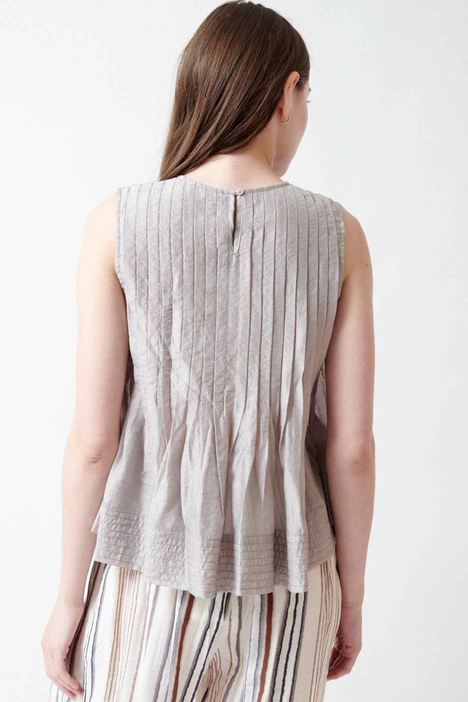 Angela wearing ELEH Janice Pleated Top rear view