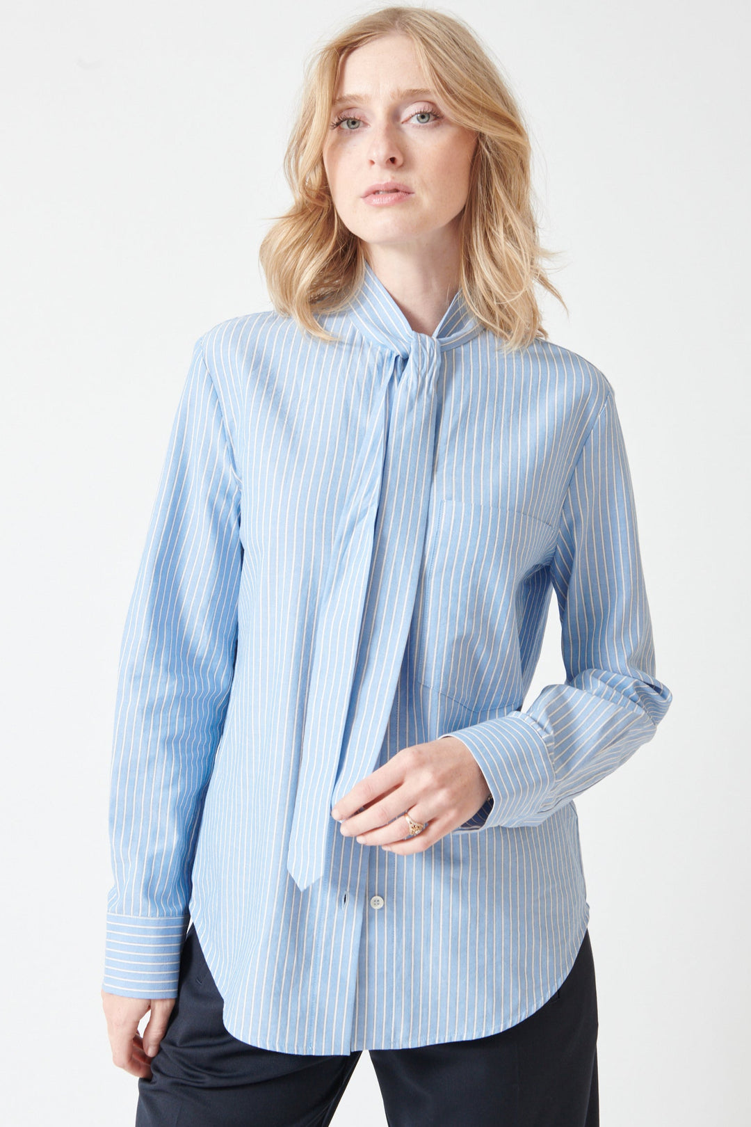 Madi wearing Tela Dory Shirt front view