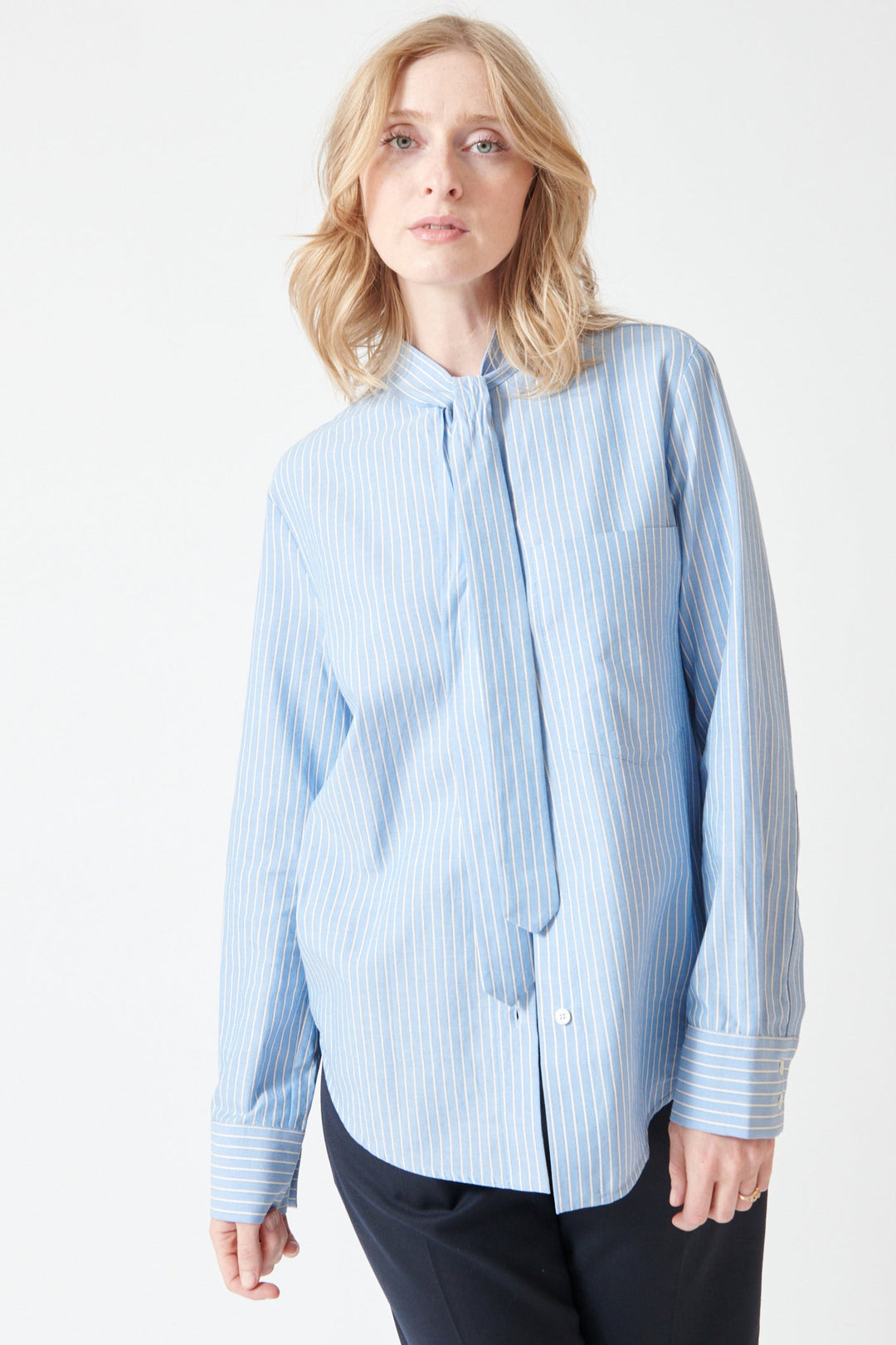 Madi wearing Tela Dory Shirt front view