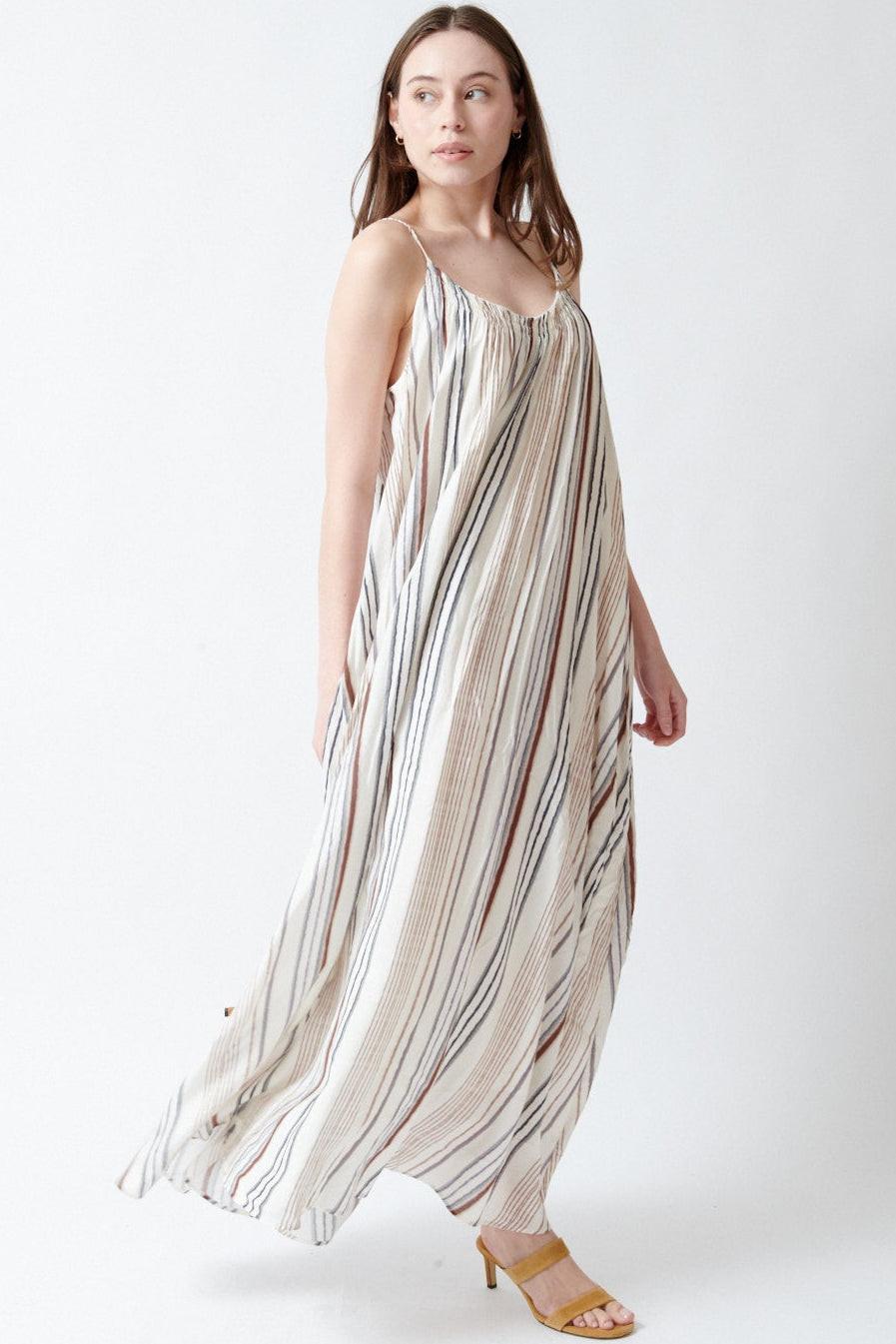 Angela wearing ELEH Gulf Striped Dress front/side view