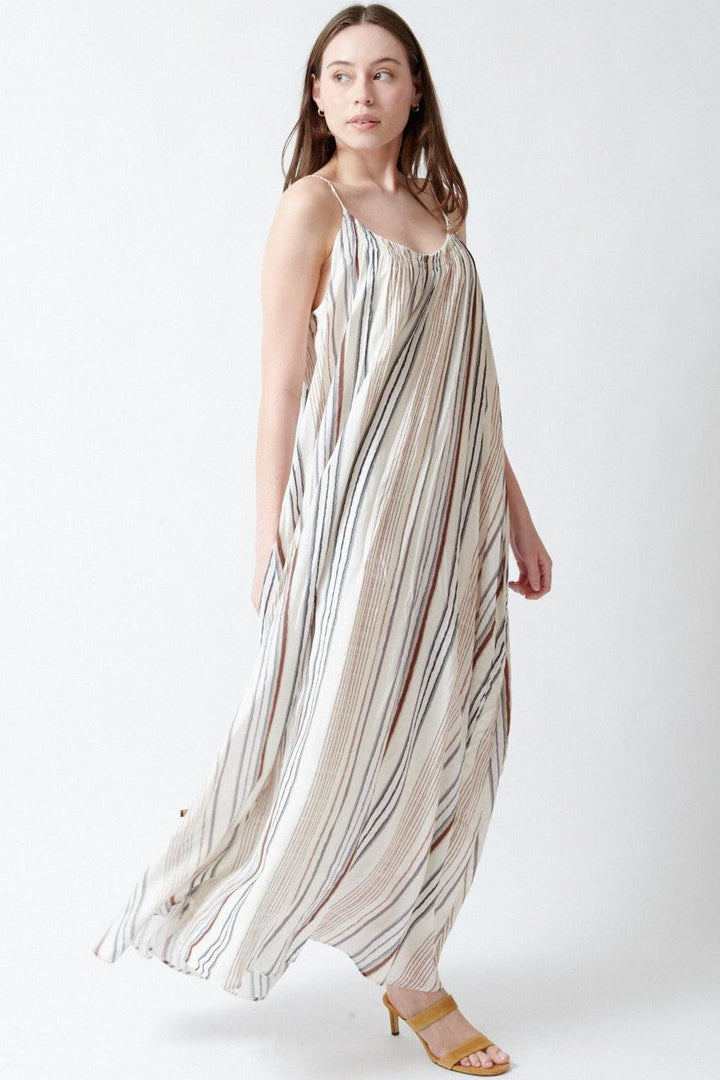 Angela wearing ELEH Gulf Striped Dress front/side view