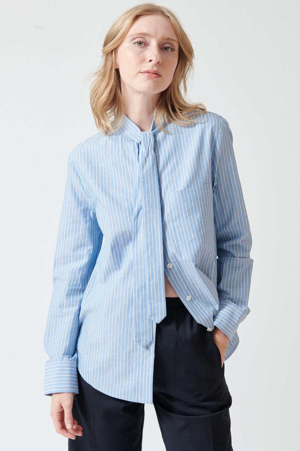 Madi wearing Tela Dory Shirt front view