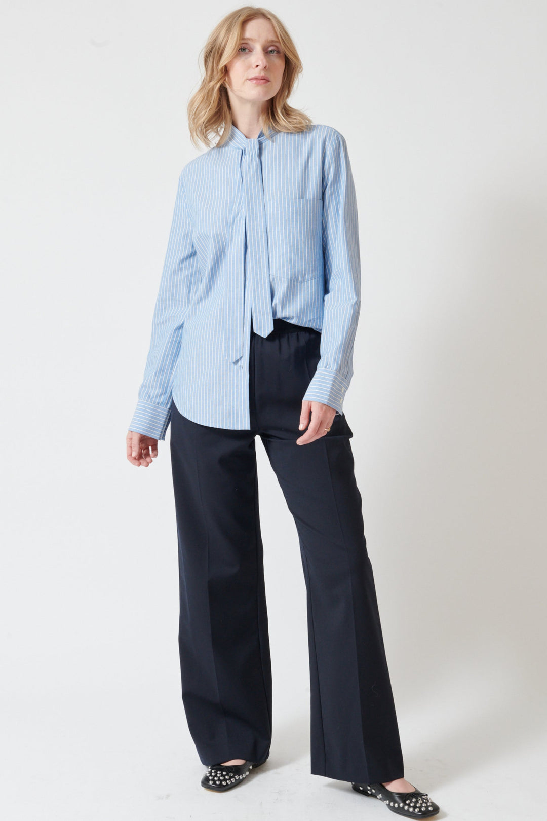 Madi wearing Tela New Stormo Trousers front view