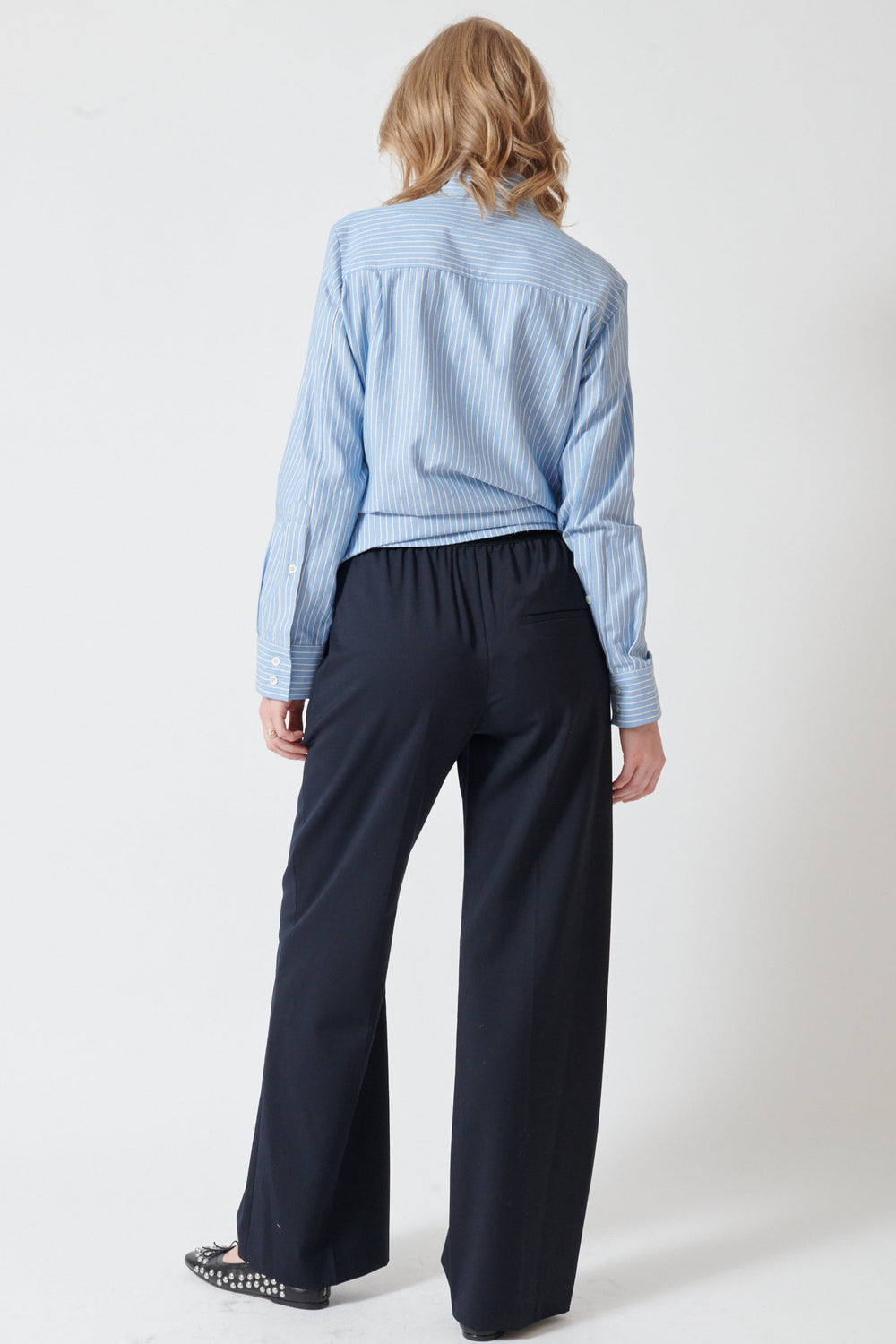 Madi wearing Tela New Stormo Trousers rear view
