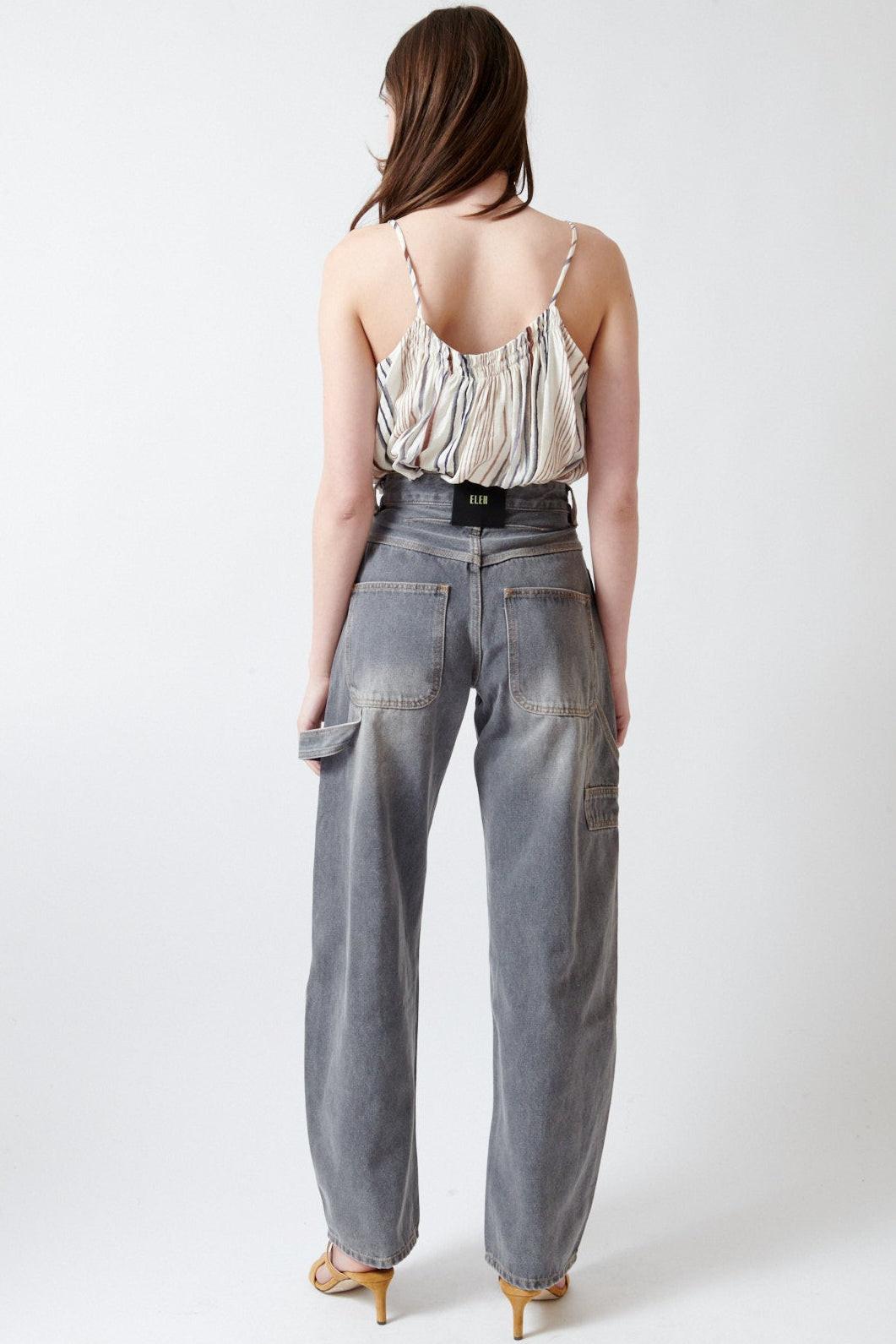 Angela wearing ELEH Ashen Denim Jeans rear view
