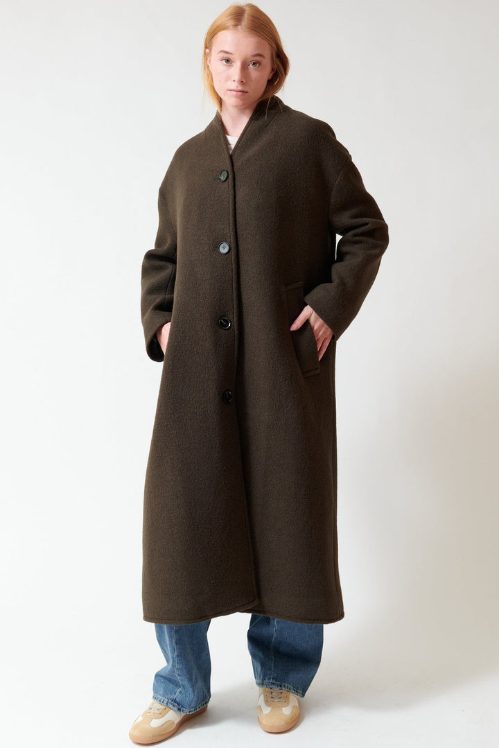 Aysia wearing Apiece Apart Safaa High Neck Coat front view