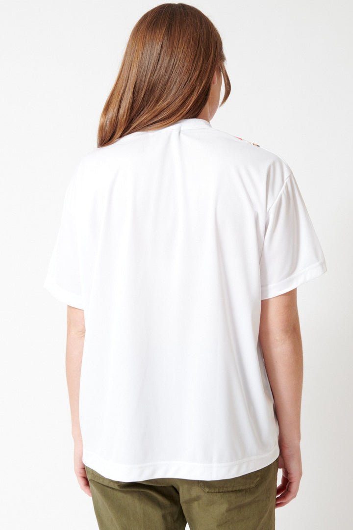 Julia wearing Comme des Garçons She Owns Everything Tee rear view
