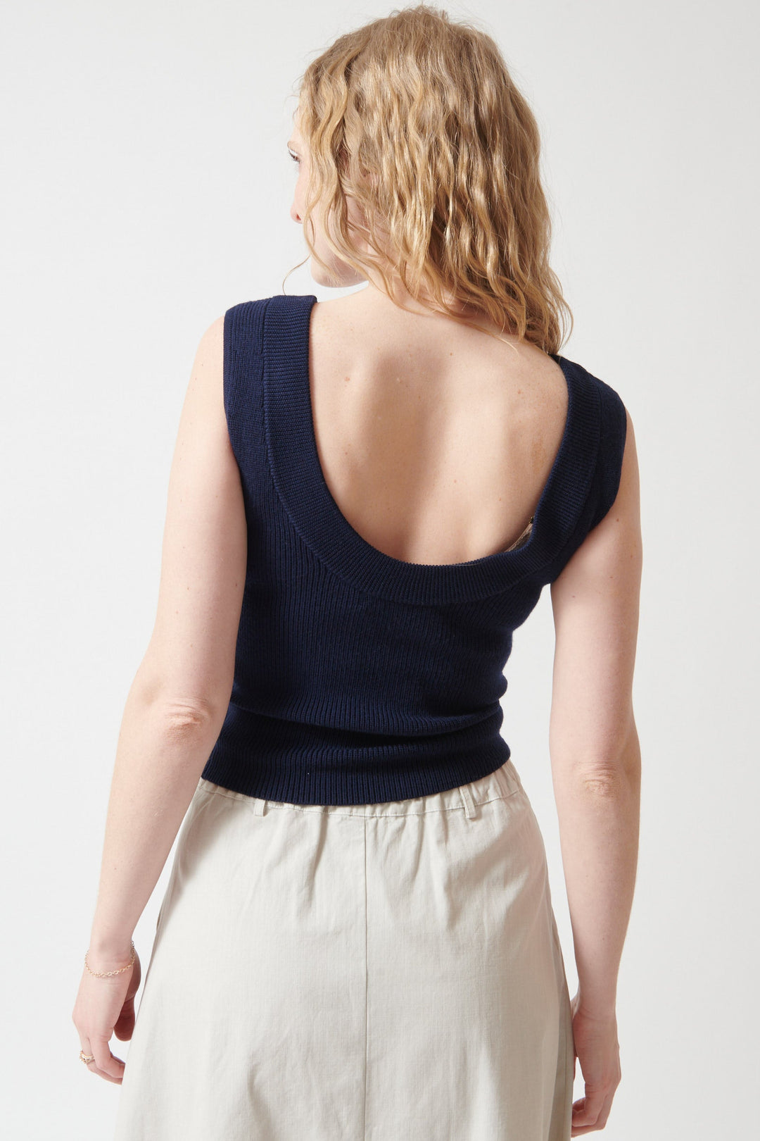 Maddi wearing White + Warren Superfine Merino Wool Tank Top rear view