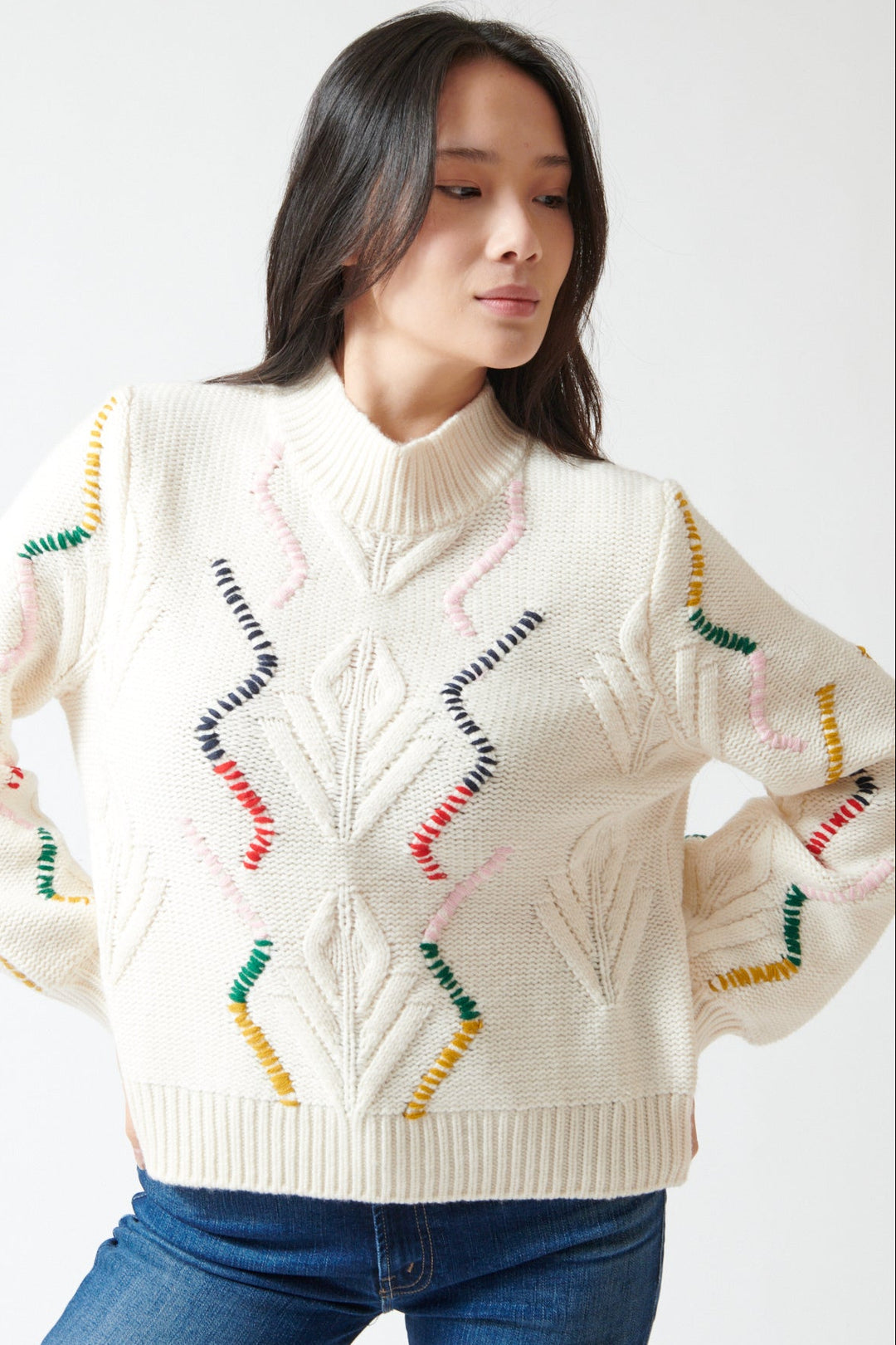 Lilly wearing Jumper 1234 Wool Cashmere Overstitch Cable Turtle front view