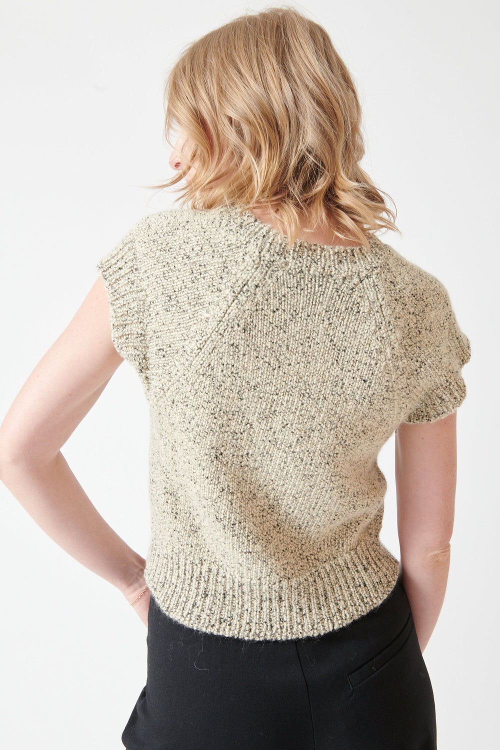 Madi wearing Tela Weslie Vest rear view