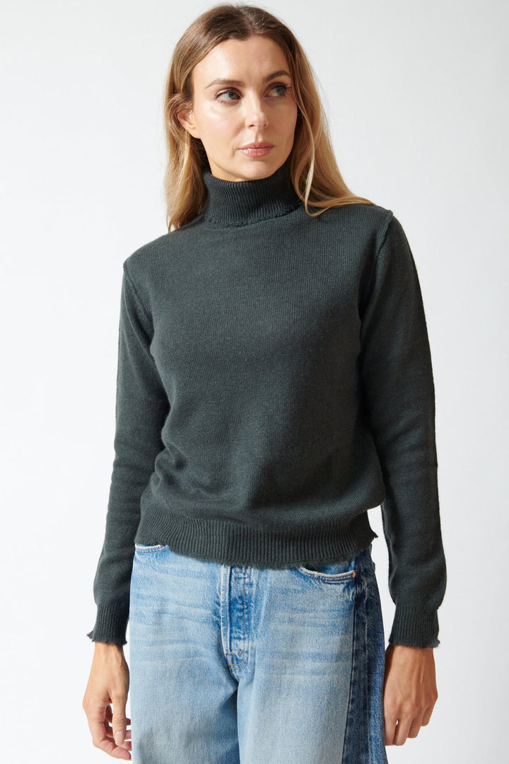 Mari wearing Jumper 1234 Cashmere Distressed Roll Collar front view