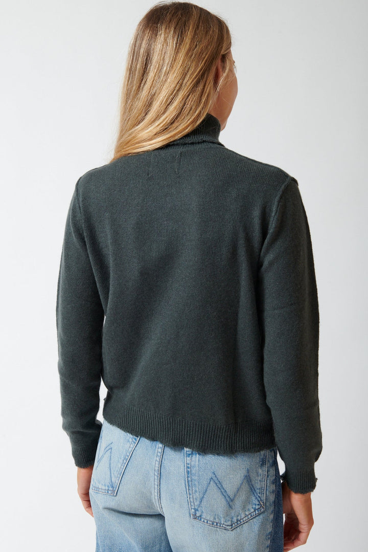 Mari wearing Jumper 1234 Cashmere Distressed Roll Collar rear view