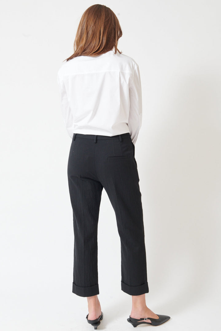 Julia wearing Tela Andrew Trousers rear view