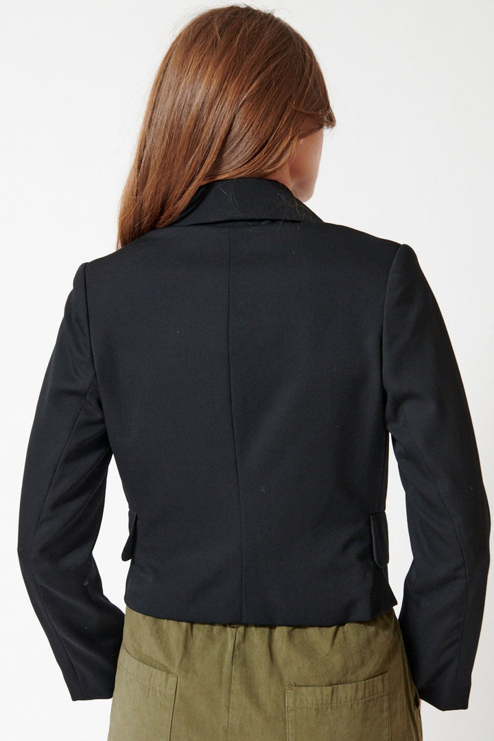 Julia wearing Comme des Garçons Folded Front Crop Jacket rear view