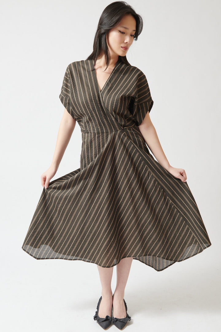 Lilly wearing Zero + Maria Cornejo Aki Wave Ripple Stripe Dress front view