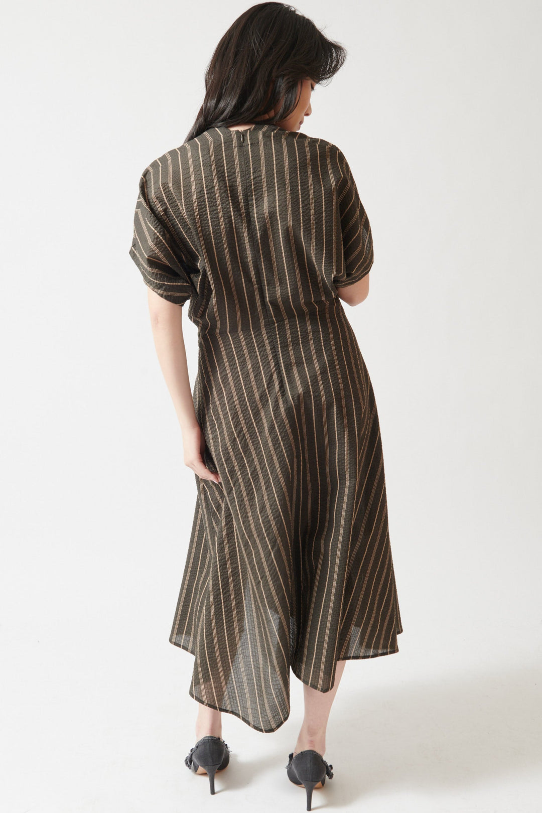 Lilly wearing Zero + Maria Cornejo Aki Wave Ripple Stripe Dress rear view
