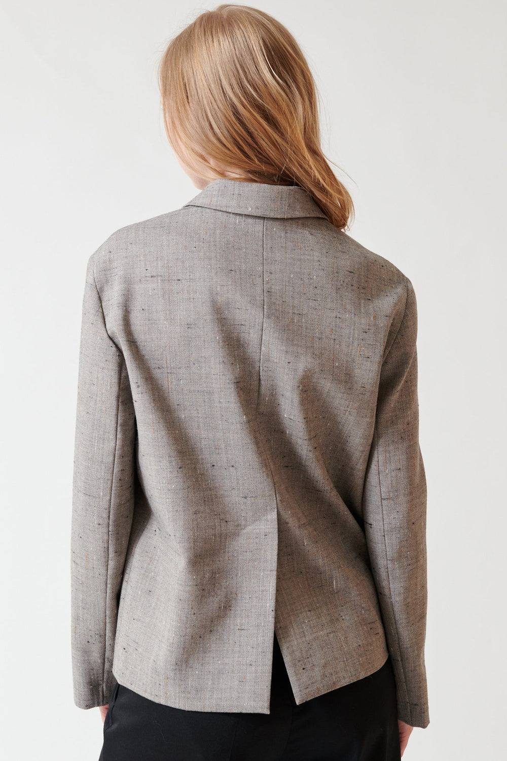 Madi wearing Tela Solare FLM Jacket rear view