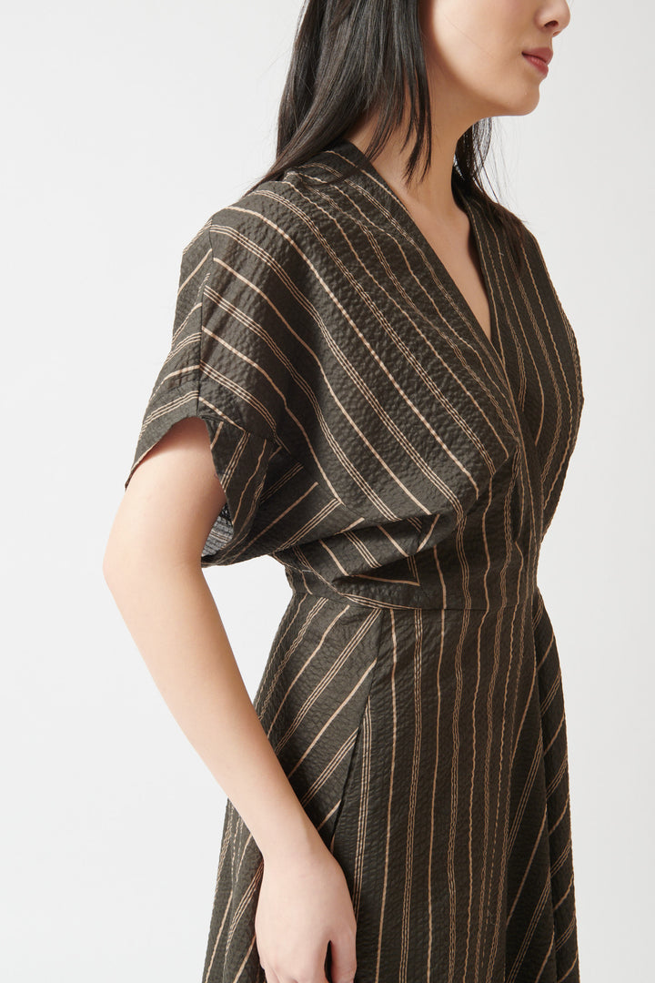 Lilly wearing Zero + Maria Cornejo Aki Wave Ripple Stripe Dress side/detail view