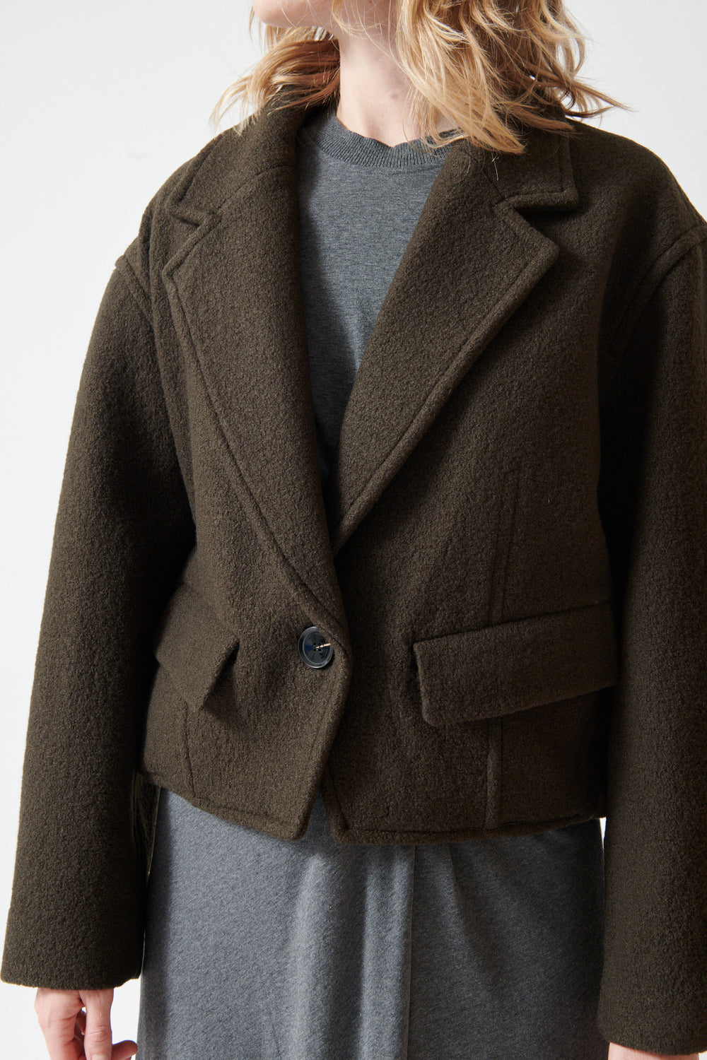 Madi wearing Apiece Apart Ria Cropped Back Jacket front view