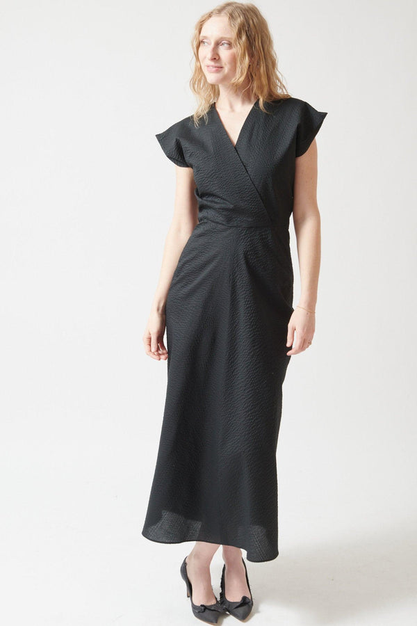 Madi wearing Zero + Maria Cornejo Ripple Twill Wrap Omi Dress front view