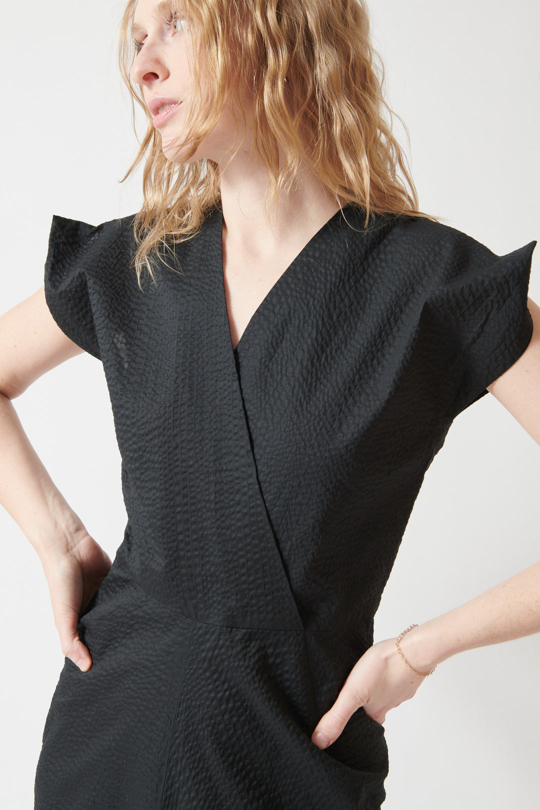 Madi wearing Zero + Maria Cornejo Ripple Twill Wrap Omi Dress front/detail view