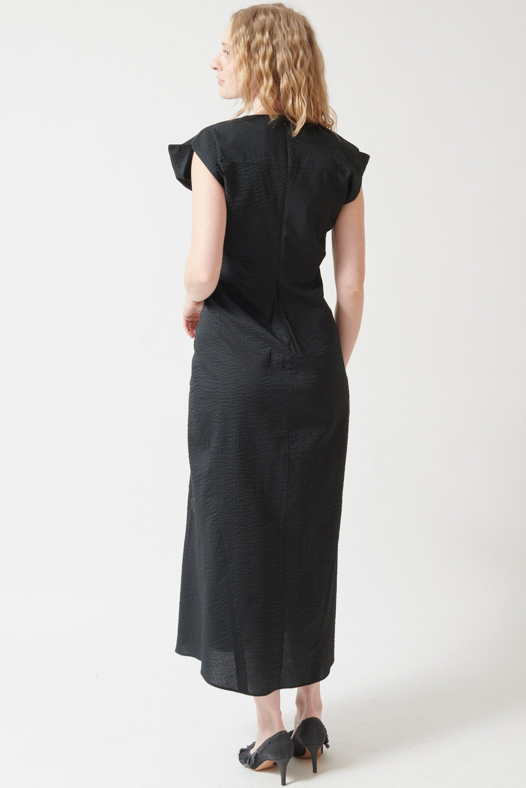 Madi wearing Zero + Maria Cornejo Ripple Twill Wrap Omi Dress rear view