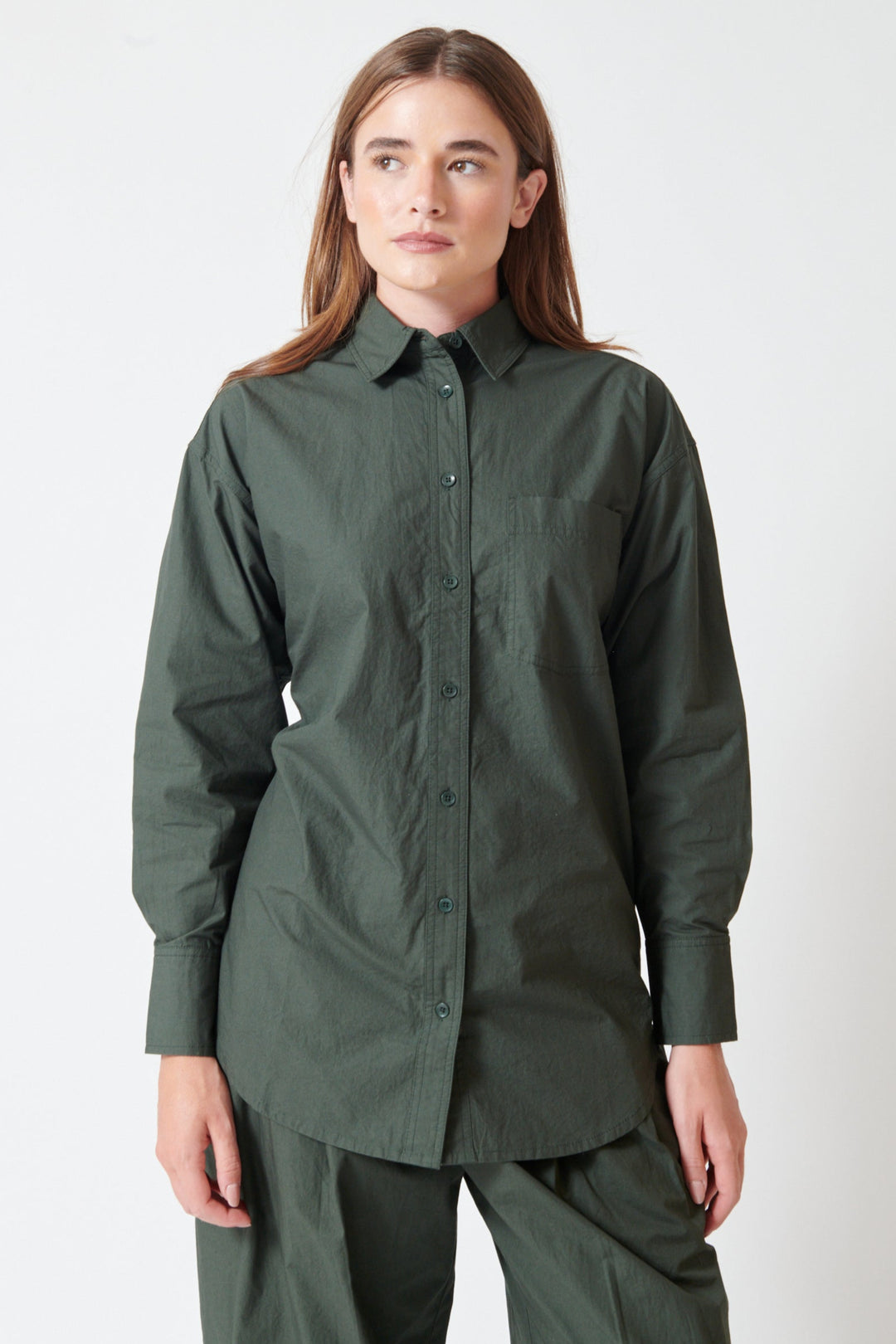Julia wearing Apiece Apart Oversized Button Down front view